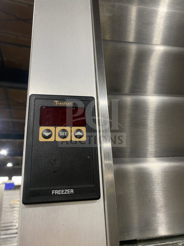 Traulsen G22010 refrigerator control panel, stainless steel exterior, LED display, and poly-coated wired rack. Model: G22010.