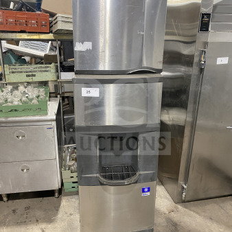 Manitowoc stainless steel ice machine and dispensing bin combo, model SD0423W, 115/120V, water-cooled on legs, shown in industrial setting.