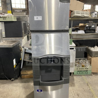 Manitowoc stainless steel ice machine, model IDO322A-161, electric, water-cooled, on legs, good condition.