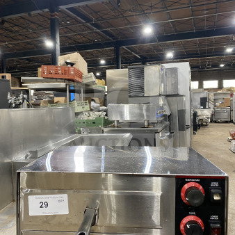 Winco EPO-1 20" commercial stainless steel electric countertop pizza oven, 120V, on legs, visible controls, model label.