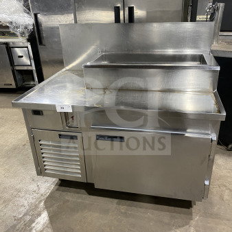 Commercial stainless steel chef base, refrigerated pizza prep station on casters. Excellent condition.