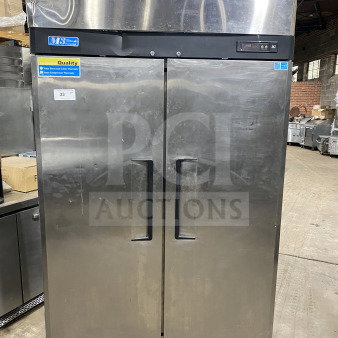 Turbo Air M3F47-2 commercial stainless steel 2-door reach-in freezer with poly-coated wired rack, good condition.