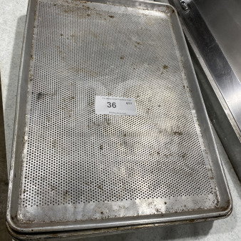 Commercial stainless steel full-size perforated sheet pan, used condition, visible wear, auction tag marked "36".