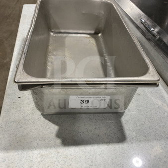 Commercial stainless steel full-size steam table pan with visible label "39" from PCI Auctions. Used condition.