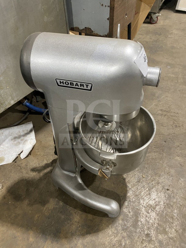 Hobart C100 commercial mixer with stainless steel bowl and paddle attachment, model 1475997, 115V, 1 phase, in good condition.