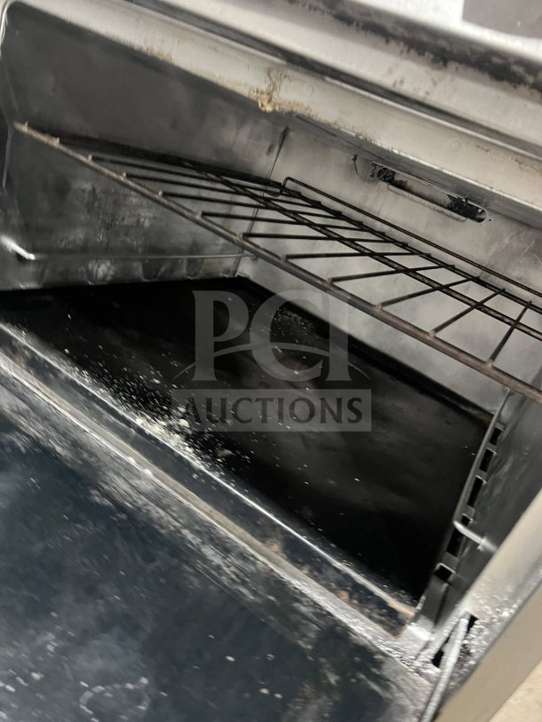 Bakers Pride EP-1 stainless steel double deck pizza oven, electric-powered, includes wired rack, 208V, 1 phase.