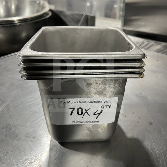 Commercial stainless steel hotel pan, stack of four, in good condition. Label reads "70 X 4, QTY."