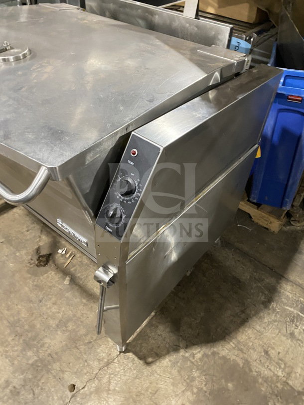 Market Forge stainless steel tilting skillet braising pan with single spout faucet, controls visible, on legs, used condition.