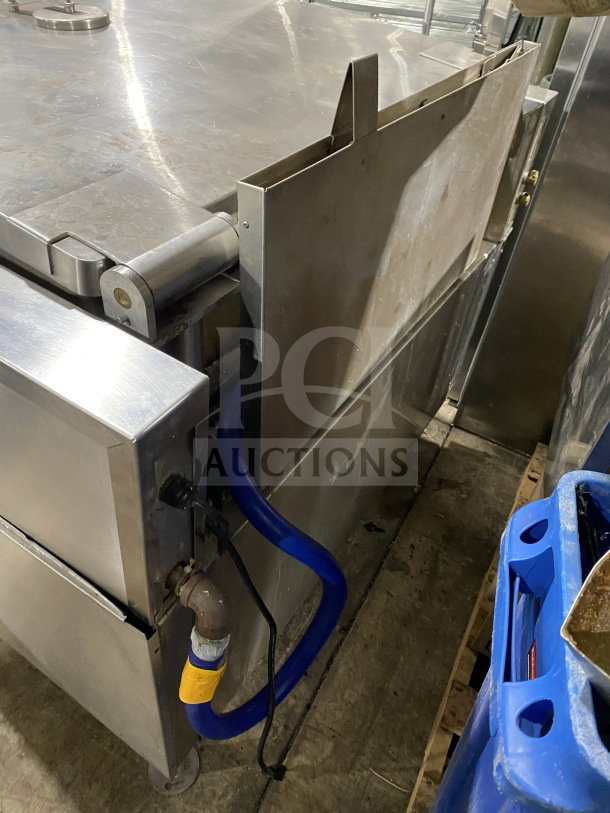 Market Forge commercial stainless steel tilting skillet braising pan with single spout faucet and legs, used condition.
