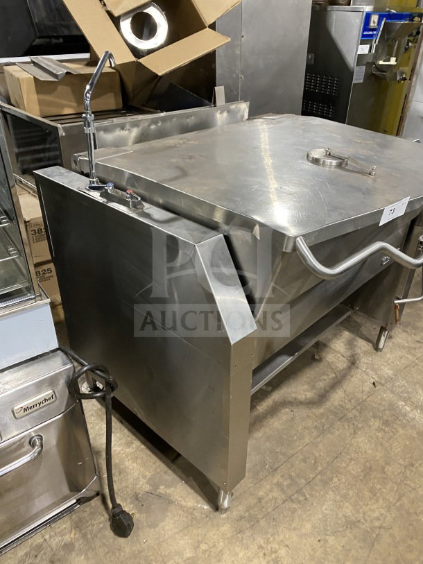 Market Forge stainless steel tilting skillet braising pan with single spout faucet on legs, in good condition.