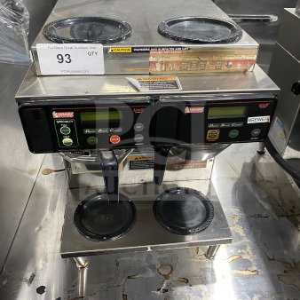 Bunn AXIOM Series twin coffee brewer with digital control, four warming plates, stainless steel, model AXIOM22TWIN, used condition.
