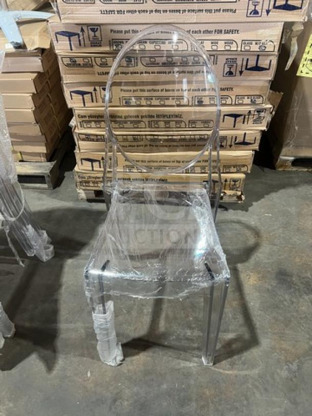 Transparent GA Ghost chair, stackable, new condition, wrapped, suitable for indoor/outdoor use, modern design.