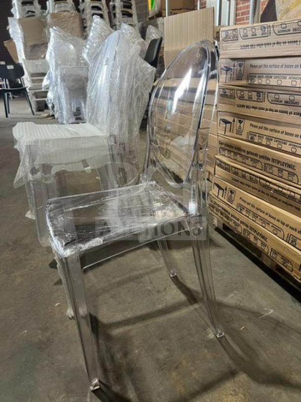 Transparent GA Ghost model chair, brand new, stackable, suitable for indoor/outdoor use. Wrapped in protective plastic.