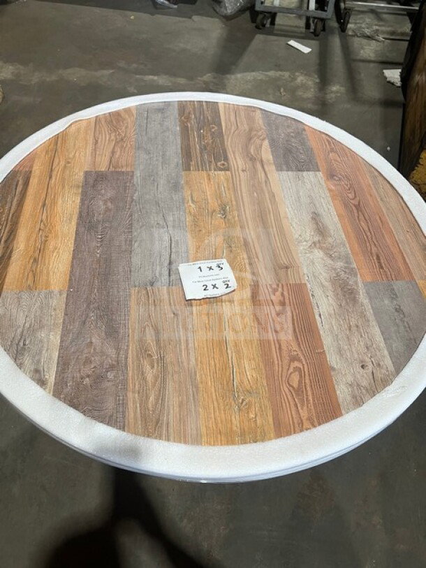 BRAND NEW OCS Barn Wood Plank 42" Round Composite Dining Table, Model DW42, with polished base, rustic design.
