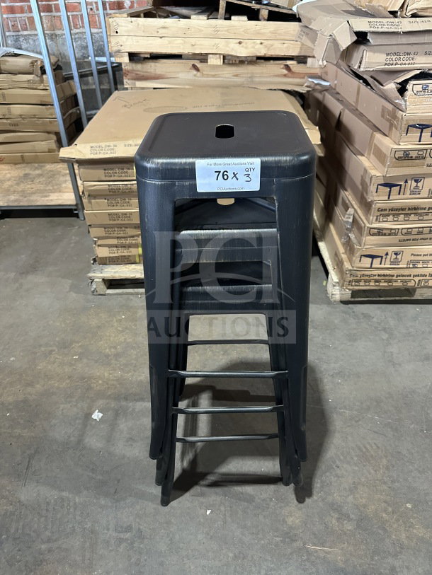 Alt text: Astor matte black backless metal counter-bar stool, industrial Tolix-style, brand new, set of three, auction display.