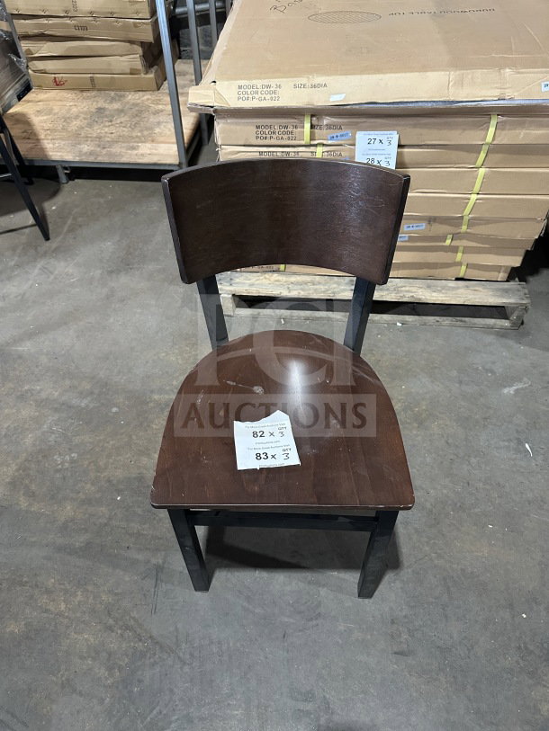 Brand new commercial dark brown restaurant chair with mahogany veneer seat and back, metal frame, in pristine condition.