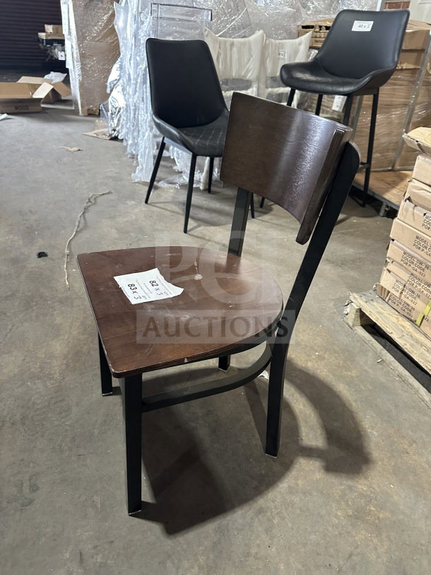 Brand new commercial chair with dark brown mahogany wood back and seat, metal frame. Veneer seat, pristine condition.