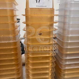 Stack of durable food storage pans, high-quality, with visible auction label numbered 17. Slight wear noted.