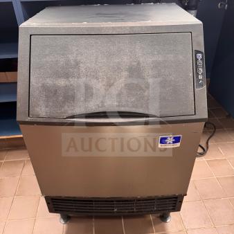Manitowoc Ice Maker UYF0140A-161B, compact undercounter design, used excellent condition, minimal wear.