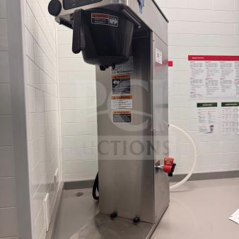 Bunn ICB-DV Tall 120V commercial coffee brewer in good condition. Features stainless steel body, control panel, and warning labels.