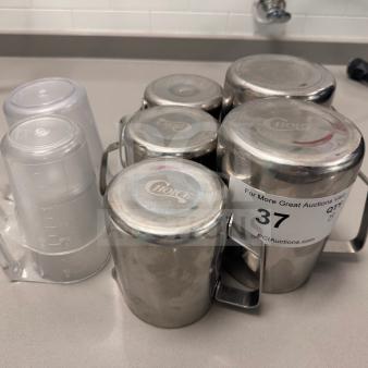 Stainless steel and plastic measuring cups set, Choice brand, good condition, auction tag number 37 visible.