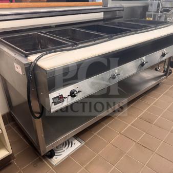 Vollrath ServeWell 5 Bay Steam Table, Model 38119, 208-240V, in very nice condition. Five compartments, control knobs visible.