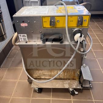 Belshaw EZ18 EZ Melt Shortening Filter System showing controls and condition. Some cosmetic wear and residue present.