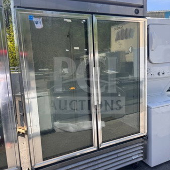 True T-49G commercial glass door refrigerator, fully operational, good used condition, minor wear, True branding visible.