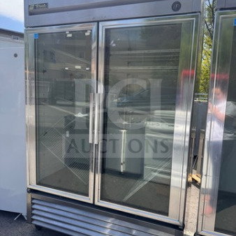 True T-49G commercial refrigerator, dual glass doors, includes interior shelves, tested and fully operational.