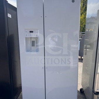 White GE side-by-side refrigerator with water and ice dispenser, used condition, missing handle, tested and working.