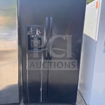 Black GE side-by-side refrigerator with water and ice dispenser. Used condition, minor cosmetic wear, tested and working.