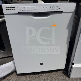 GE built-in dishwasher in good condition with control panel, visible wear, and intact interior racks and utensil holders.