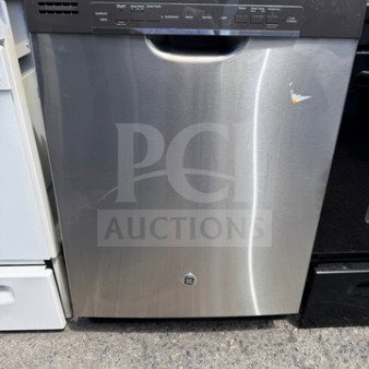 GE built-in dishwasher, stainless steel, good condition with visible wear, intact interior racks and utensil holders.