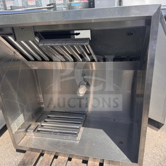 ACCUREX 4ft stainless steel hood in good condition, featuring baffle filters and commercial-grade construction.