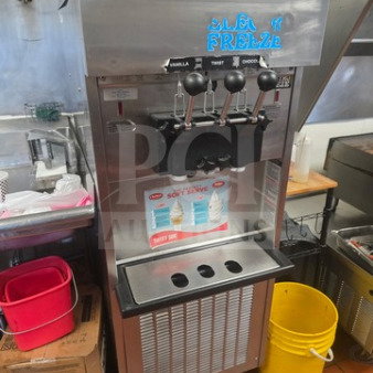 Electro Freeze SL500-232 soft serve ice cream machine, stainless steel, three levers, visible labels, untested, sold as is.