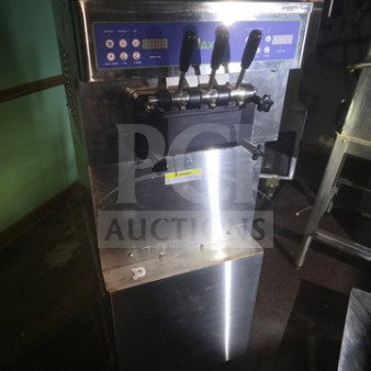 Max Ice M-320T soft serve ice cream machine, stainless steel. Unknown working condition, sold as is. Control panel visible.