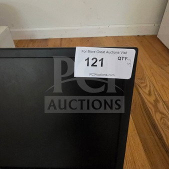Lot of two computer monitors, unknown condition, sold as is. Auction tag displaying "121 QTY: 2" visible.
