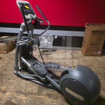 Precor EFX series elliptical trainer, unknown working condition, sold as is, gray finish, visible wear, manual controls.