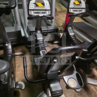 Cybex 530R recumbent exercise bike, unknown working condition, sold as is. Features digital display and adjustable seat.