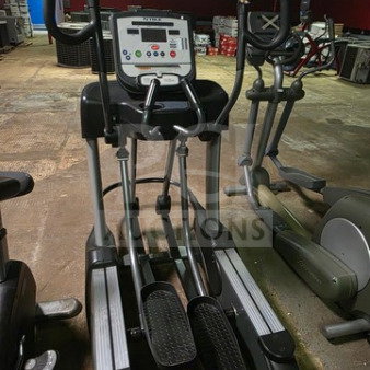 True Fitness CS900 Elliptical Machine, black and silver, unknown working condition, sold as is. Digital display panel.