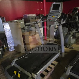 FreeMotion Incline Trainer Treadmill on pallet, unknown working condition, featuring console with display and controls.