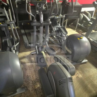 Life Fitness 9500HR Elliptical Machine, gray, unknown working condition, sold as is, multiple units visible in gym setting.