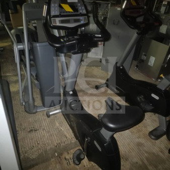 Cybex commercial upright exercise bike, black, with console display. Unknown working condition. Sold as is.