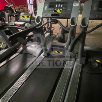 Life Fitness Integrity Series treadmill, unknown working condition, sold as is, with control panel and tread visible.