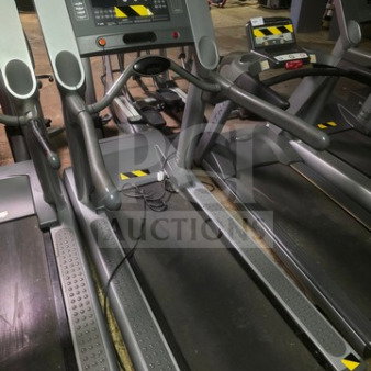Life Fitness 95Ti commercial treadmill, gray, in unknown working condition, sold as is, features digital display and sturdy design.