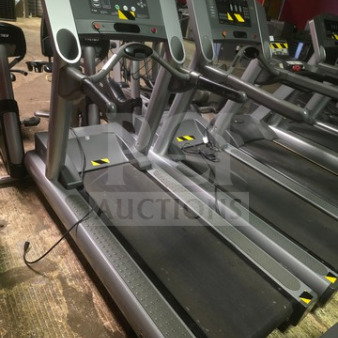 Life Fitness 95Ti commercial treadmill, sold as is, unknown working condition, features gray frame and digital console.