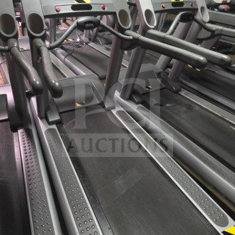 Life Fitness Integrity Series treadmill, unknown condition, sold as is. Features console controls and handrails.