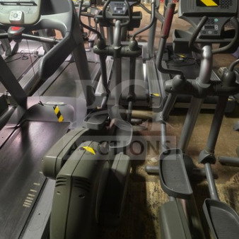 Life Fitness commercial-grade elliptical machine, unknown working condition, sold as is. Multiple machines visible.