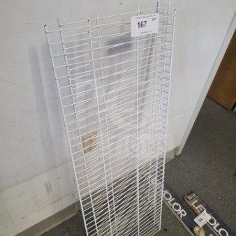 Lot of metal wire shelves, white, vertical orientation. Includes auction tag number 167. Ideal for storage solutions.
