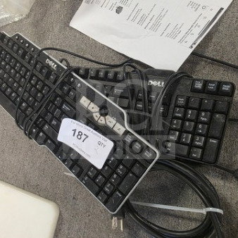 Lot of 2 Dell computer keyboards, wired, black, with numeric pads. Visible number tag: 187, includes cables. Slight wear.